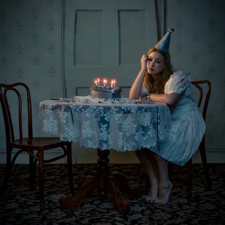 Loser’s Guide to Life album cover — Blythe Woods at a birthday table in a paper crown